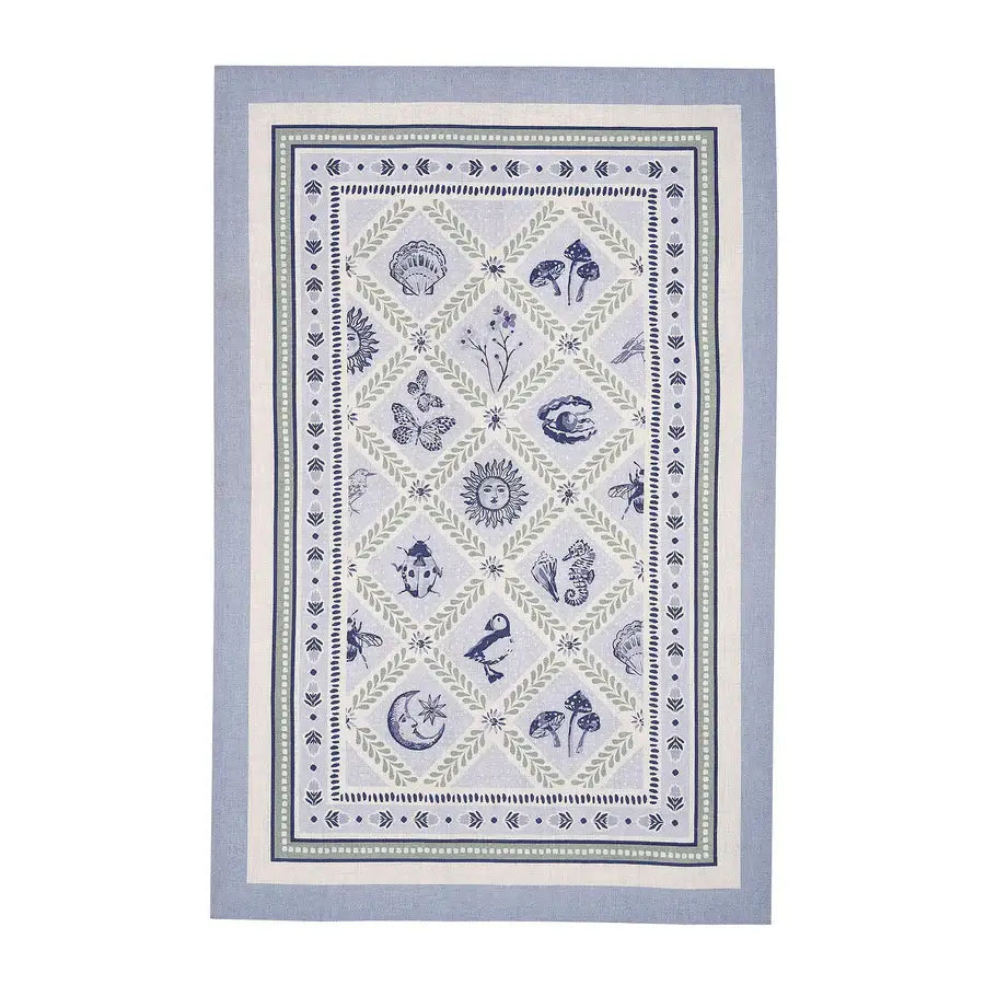 Decorative tea towel with geometric pattern on a white background