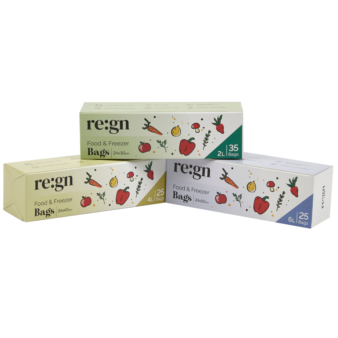 Two oxes of 're:gn' food and freezer bags on a white Background