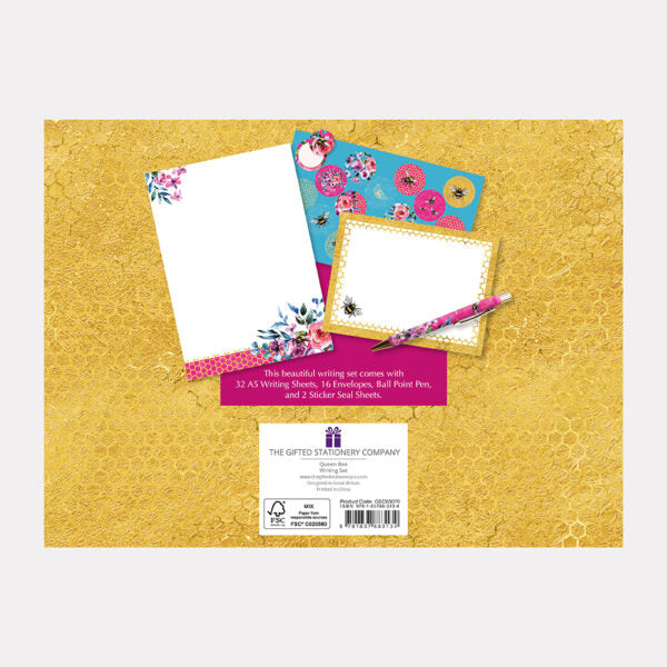 Writing set with stationery items on a textured yellow background