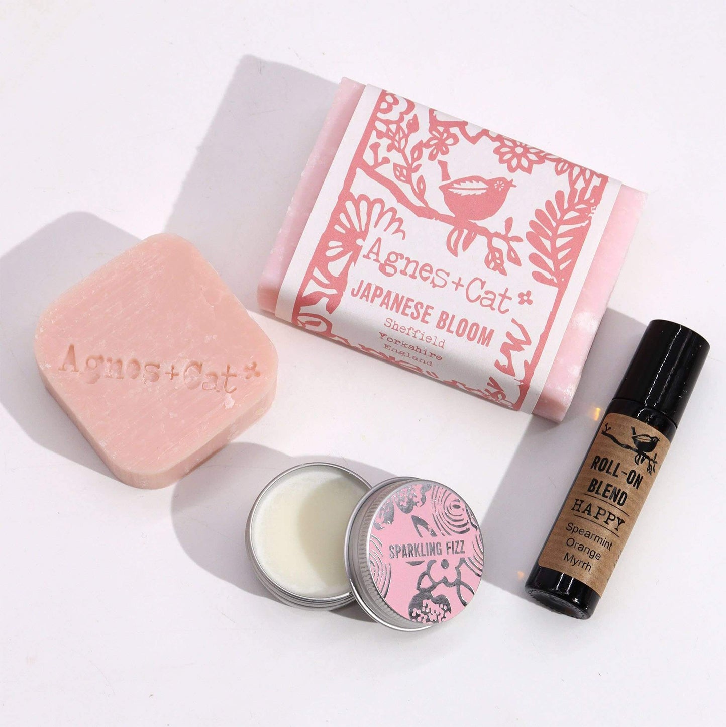 Soap, shampoo bar, lip balm and essential oil roll on