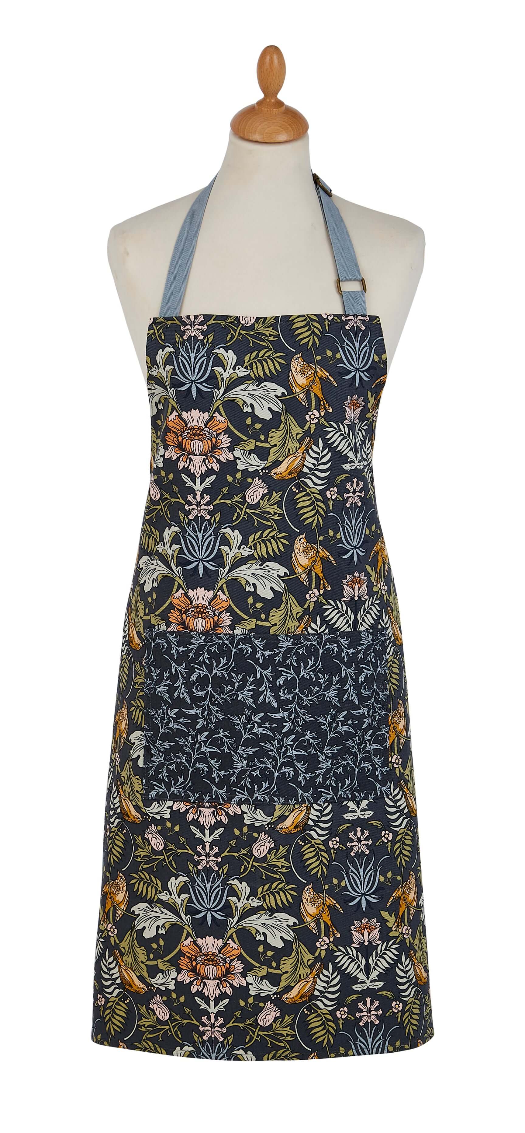 Floral apron on a mannequin against a white background