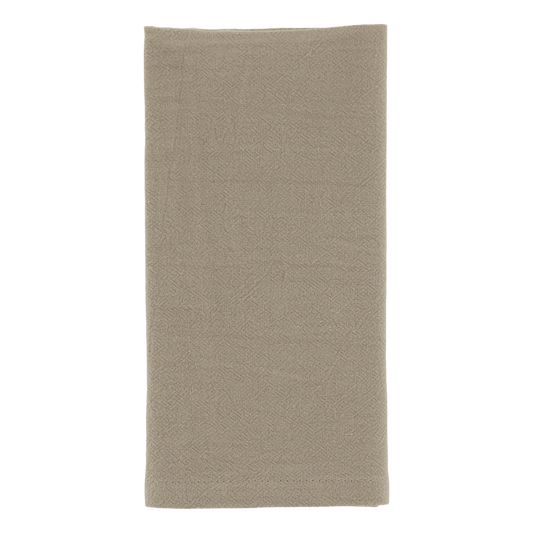 A folded rectangular napkin in a warm taupe-beige color, showing a subtle woven texture, isolated on a solid white background.
