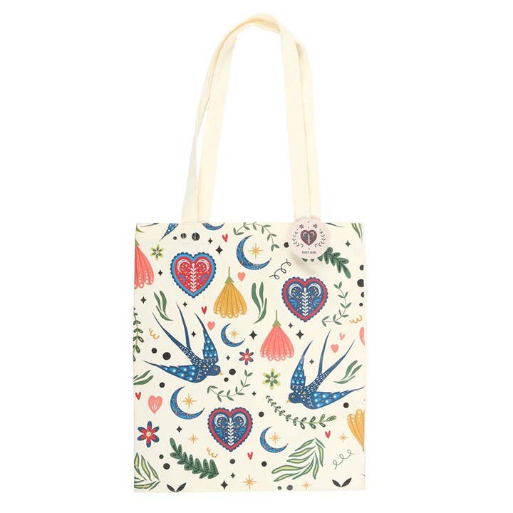 Tote bag with colorful patterns on a white background