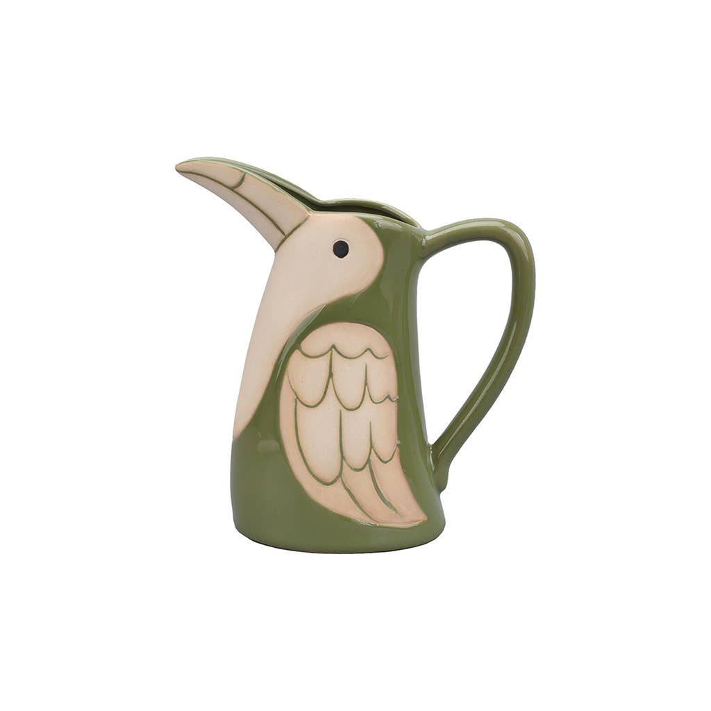 Green ceramic pitcher shaped like a bird on a white background