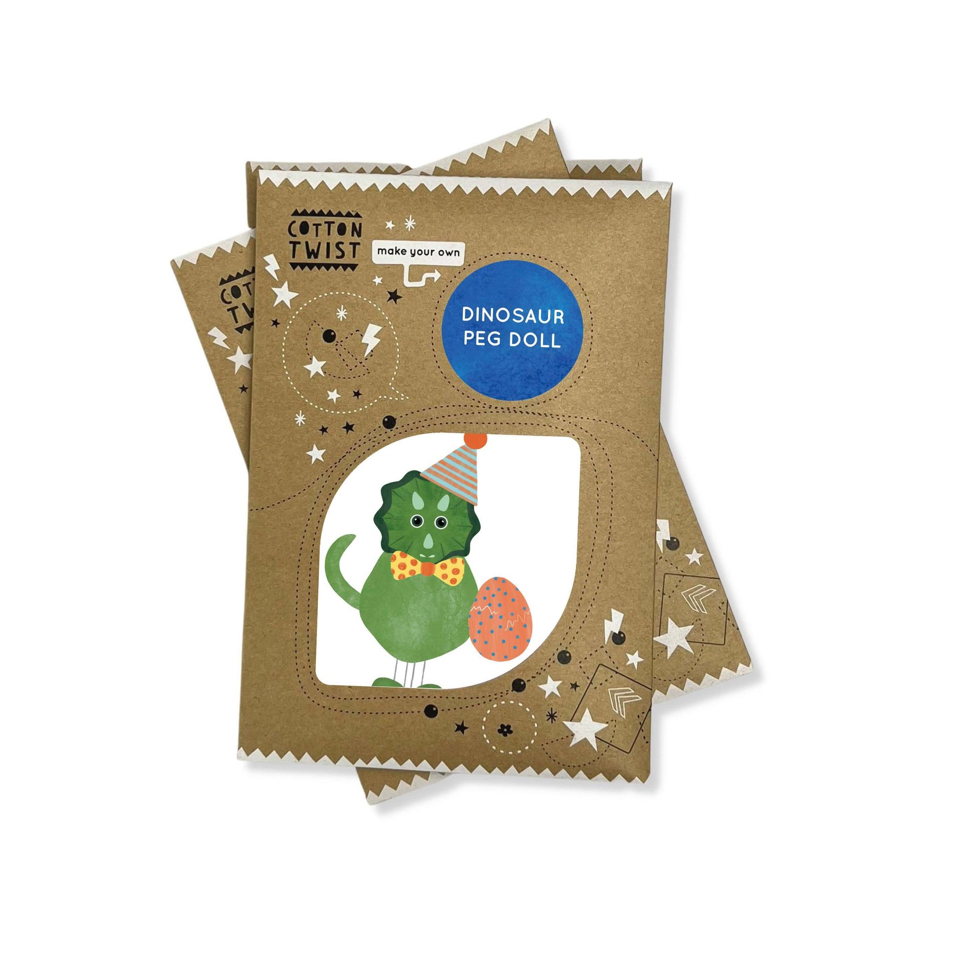 Packaging for a dinosaur peg doll toy, featuring a cardboard cut-out dinosaur with a bow tie and an egg, with stars and a 'Citizen Twist' logo on the envelope.