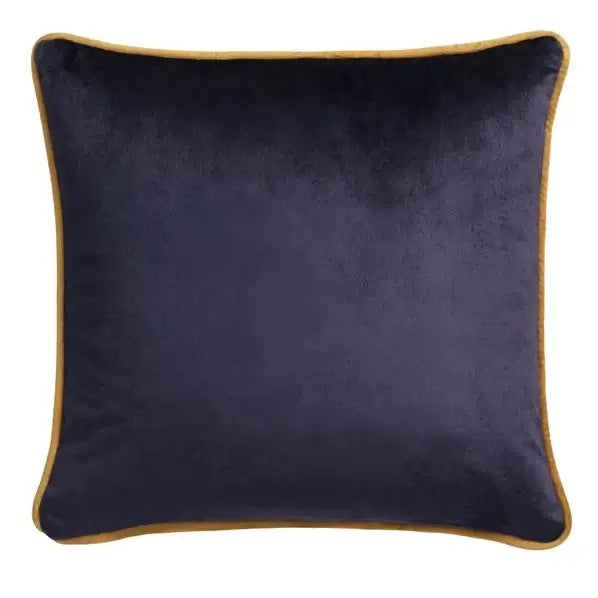 Navy blue pillow with gold trim on a white background