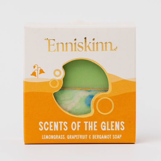 Enniskinn soap packaging with a green soap bar inside, on a white background