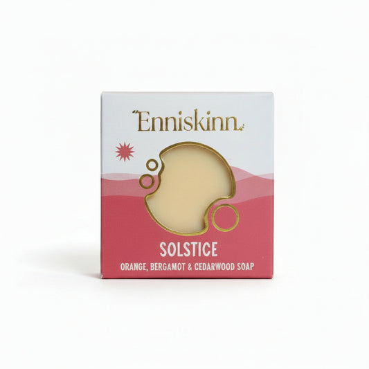 Enniskinn Solstice soap packaging on a neutral background