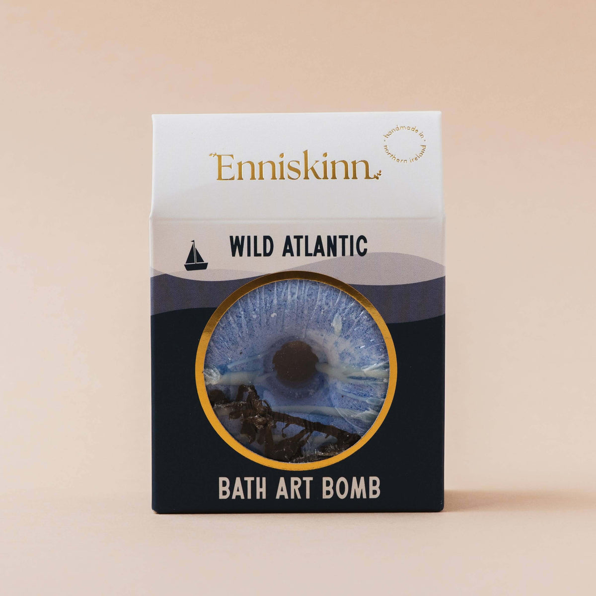 Enniskinn Wild Atlantic bath art bomb packaging on a beige background