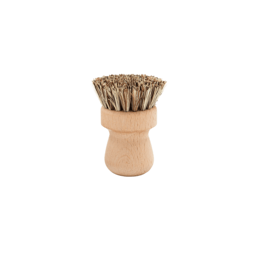 Ergonomic dish brush on white background