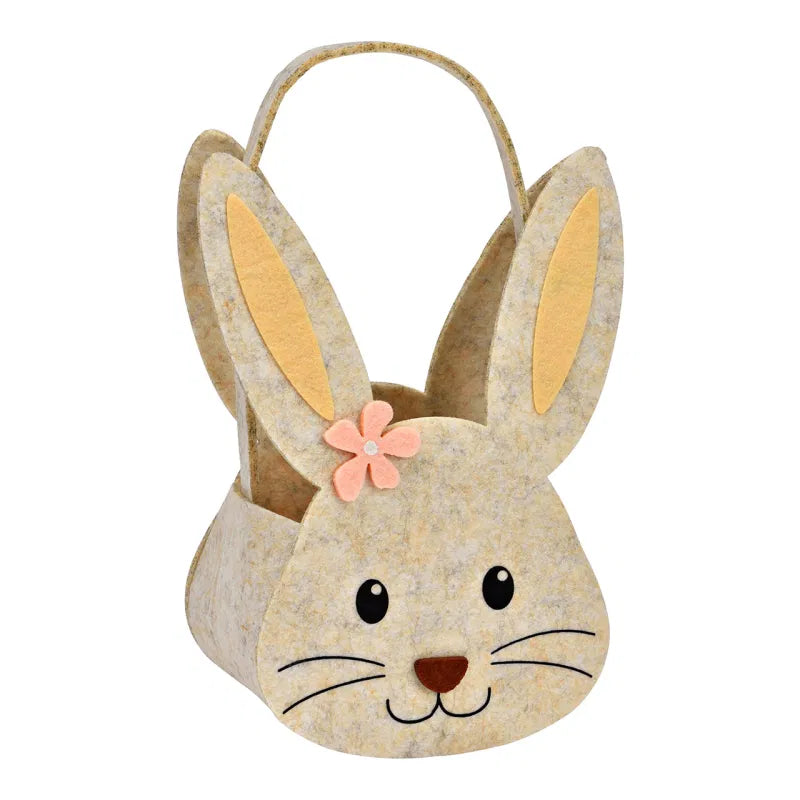 Bunny-shaped basket with a flower on a white background
