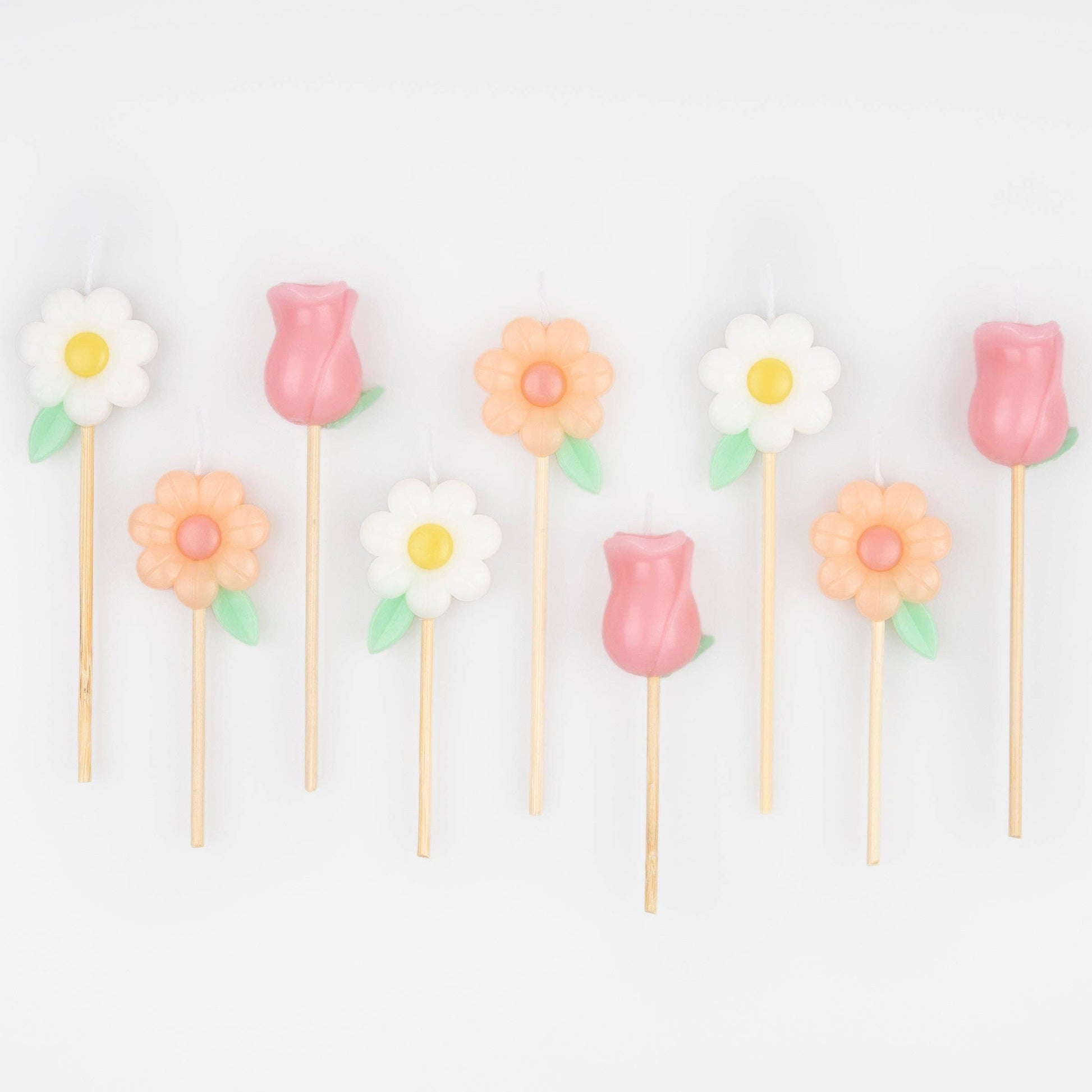 Decorative flower and rose picks on a white background