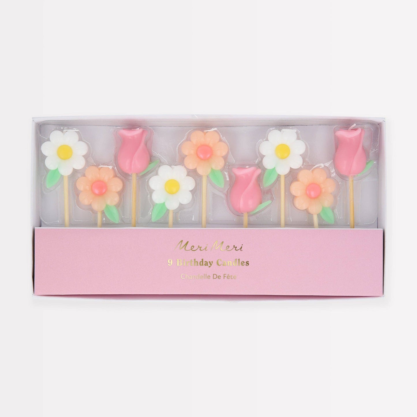 Set of flower-shaped candles in a box with 'Meri Meri' branding on a white background