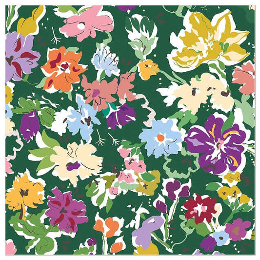 A colorful floral patterned napkin featuring stylized flowers in pink, yellow, purple, orange, blue, and cream on a dark green background.