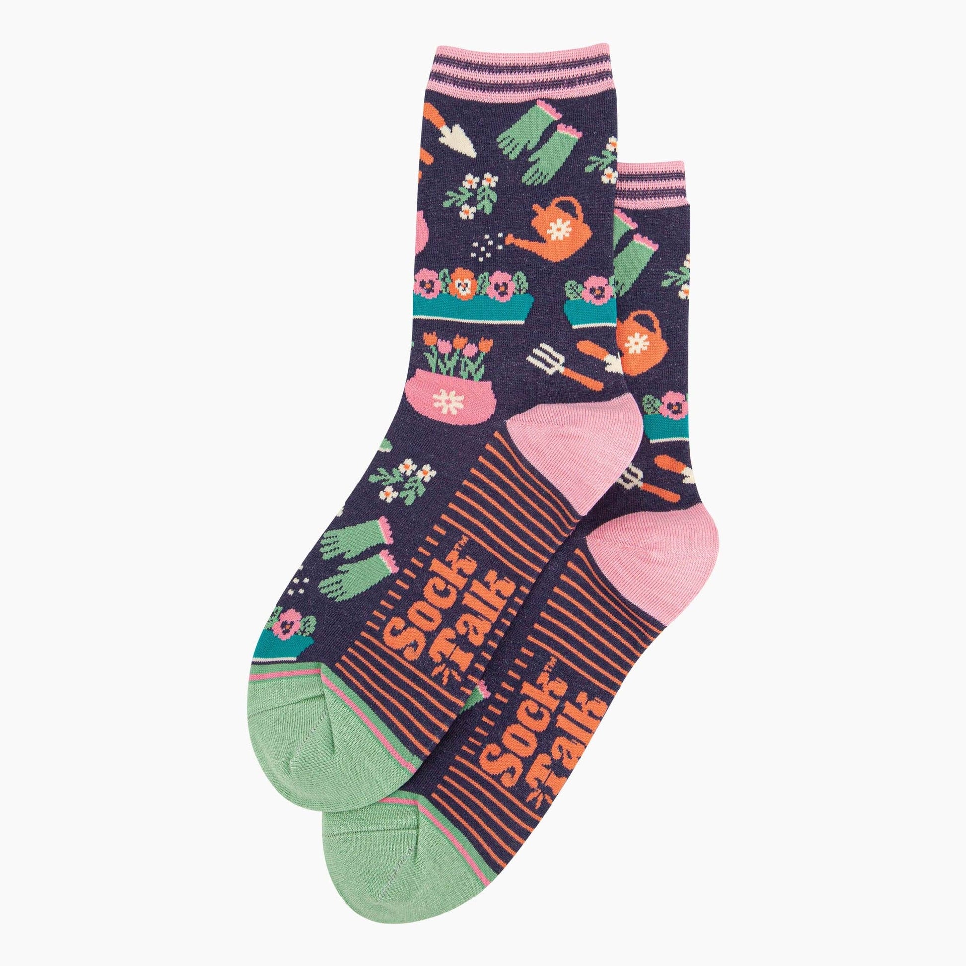 Colorful socks with gardening-themed design on a white background
