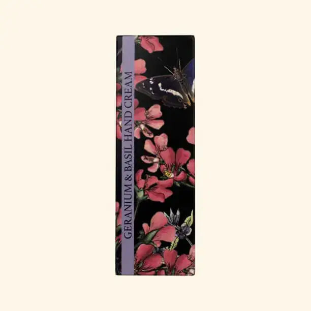 Hand cream packaging with floral design and butterfly on a beige background