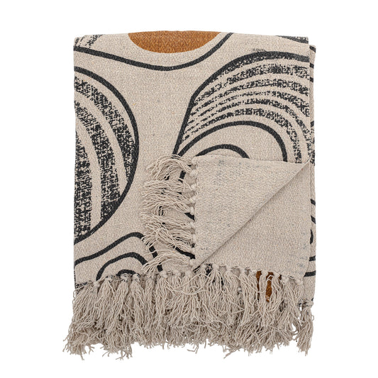 Textile with geometric pattern and fringes on a white background