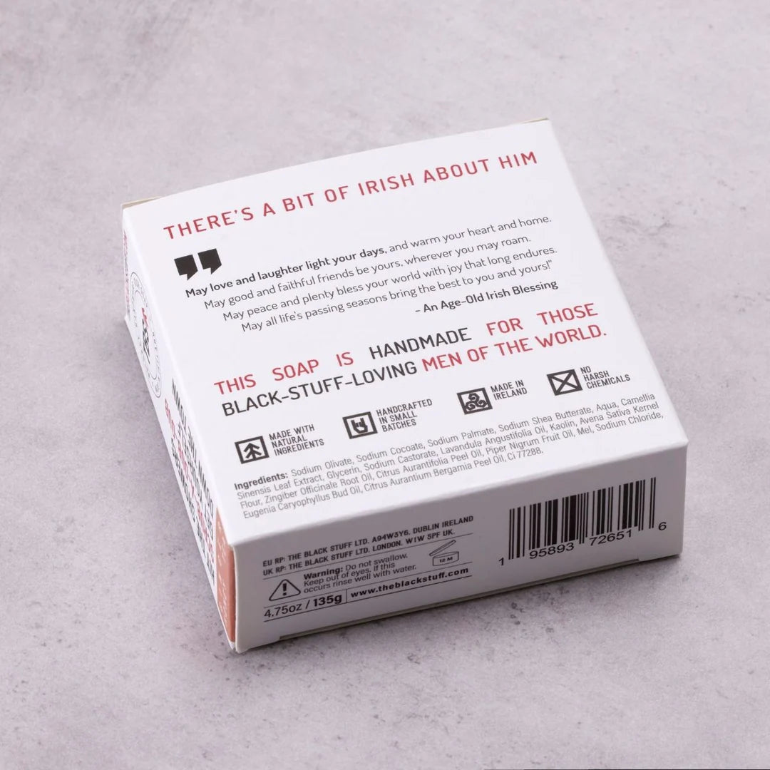 Back of a soap packaging box with text on a gray background