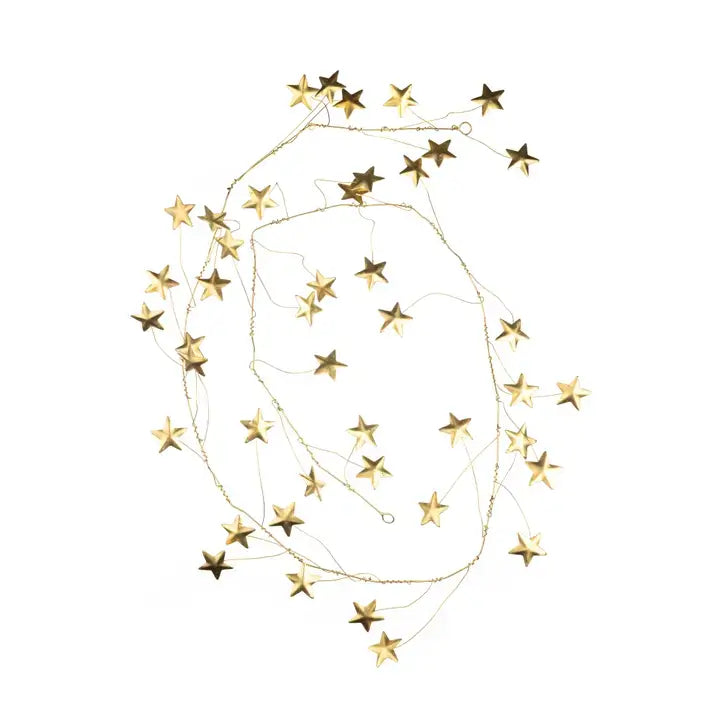 Gold star-shaped metal garland arranged in a loose circular pattern on a solid white background.