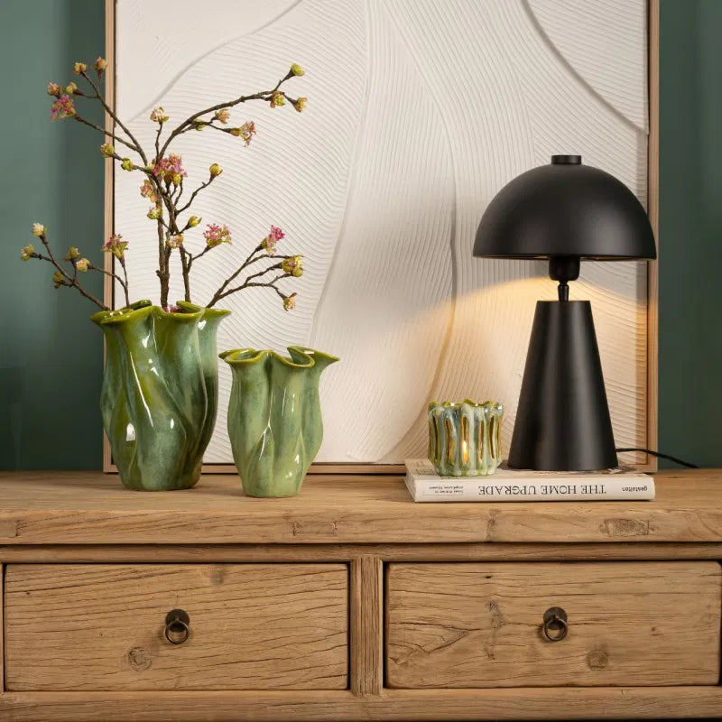 Green Fluted Top Vase on a sideboard