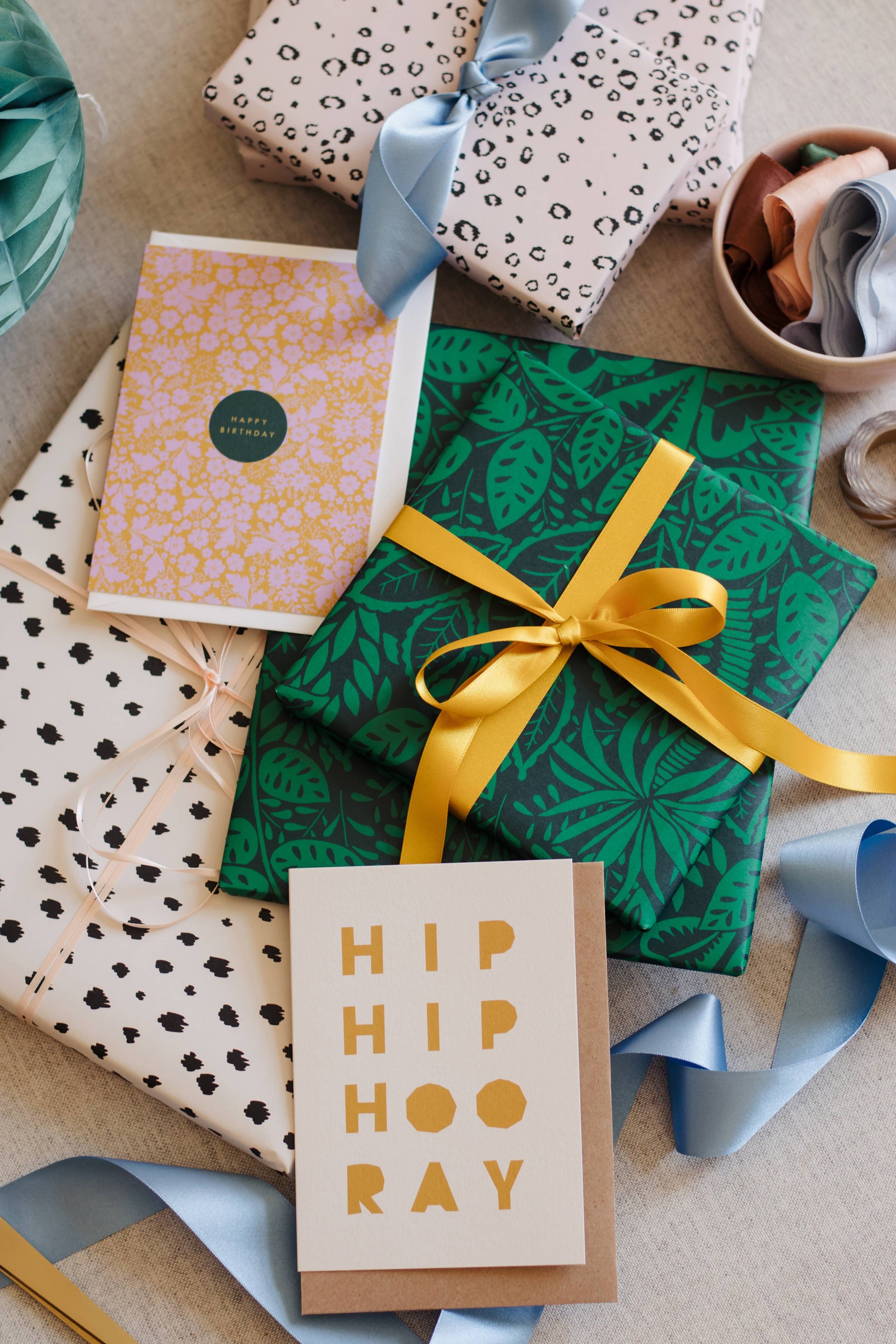 Assorted gift wrapped parcels on a table