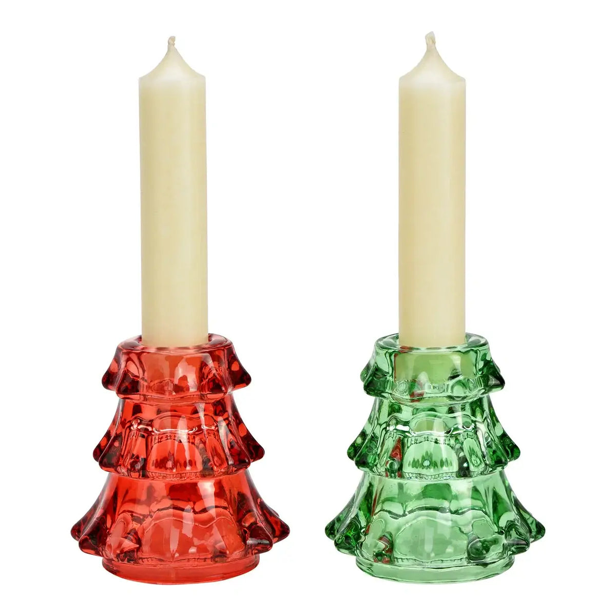 Red and green glass candle holders with white candles on a white background