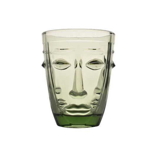 Clear drinking glass with face design on a white background