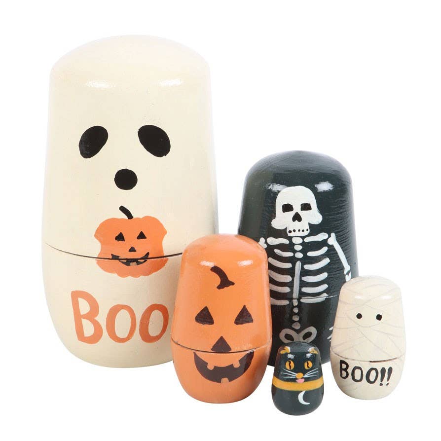 Set of Halloween-themed nesting dolls with ghost, pumpkin, skeleton, and cat designs.