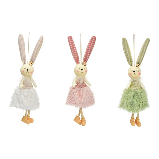 Three decorative bunny ornaments with different colored dresses on a white background