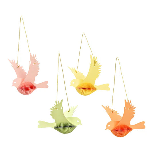 Set of four colorful bird-shaped decorations on a white background
