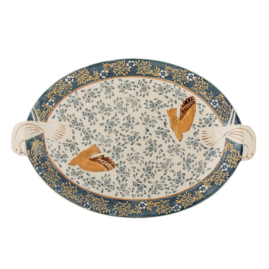 Decorative plate with floral patterns and hand painted bird designs on a white background