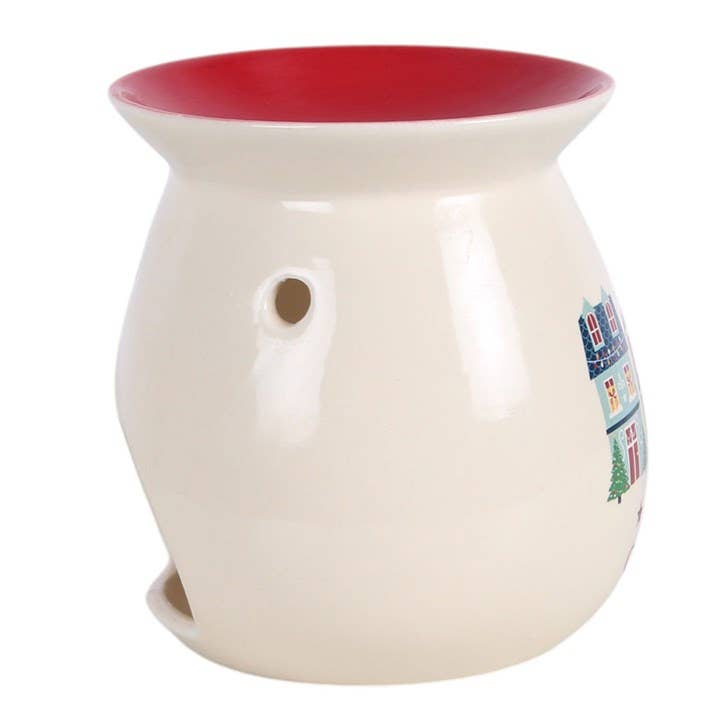 White wax warmer with red interior on a white background