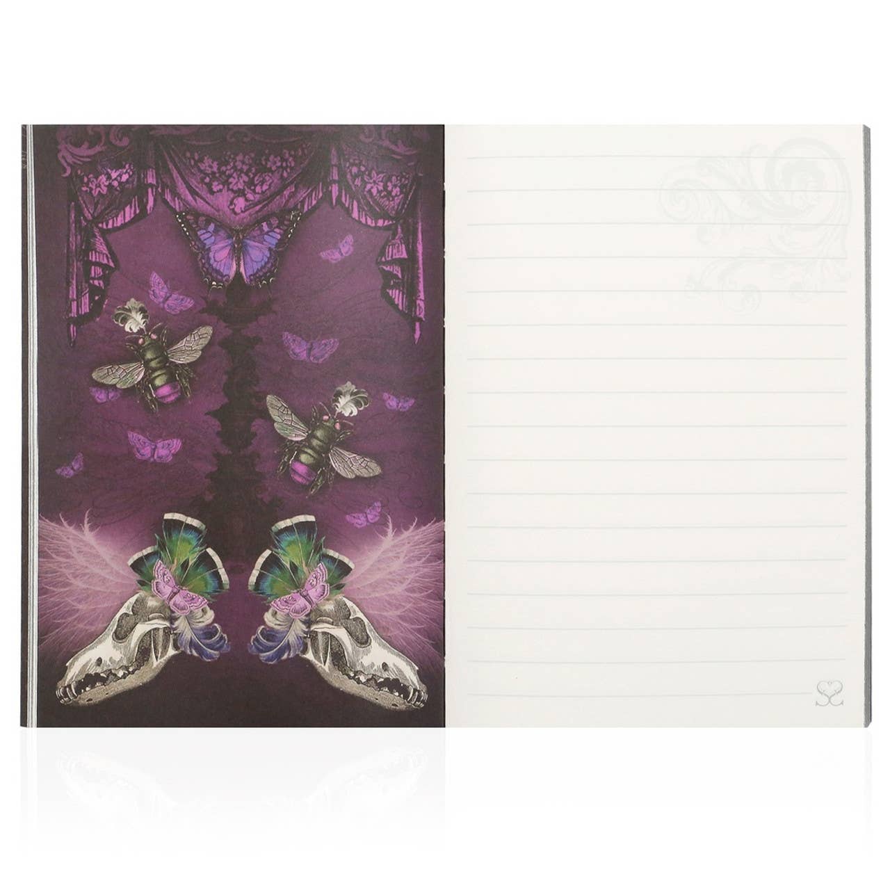 Notebook with a decorative cover featuring butterflies and skulls on a purple background.