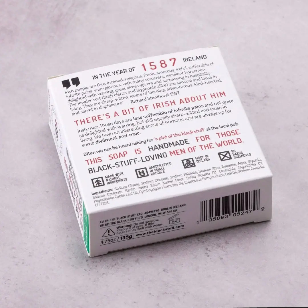 Back of Packaging for 'The Black Stuff' Irish Mountain Rain bar soap, featuring the product name, and  description.