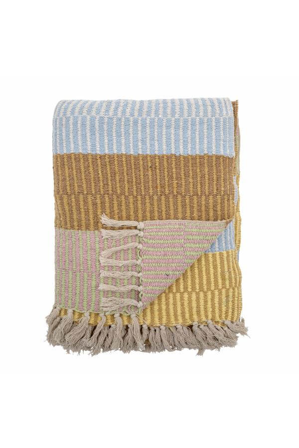 Woven blanket with multicolored stripes and fringes on a white background