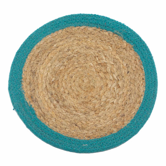 A round placemat made of natural jute with a teal colored cotton edge, designed for use on a dining table.
