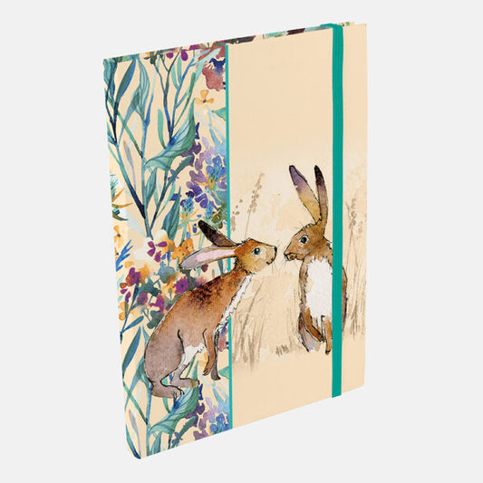 Notebook with hare illustration and floral design on a white background