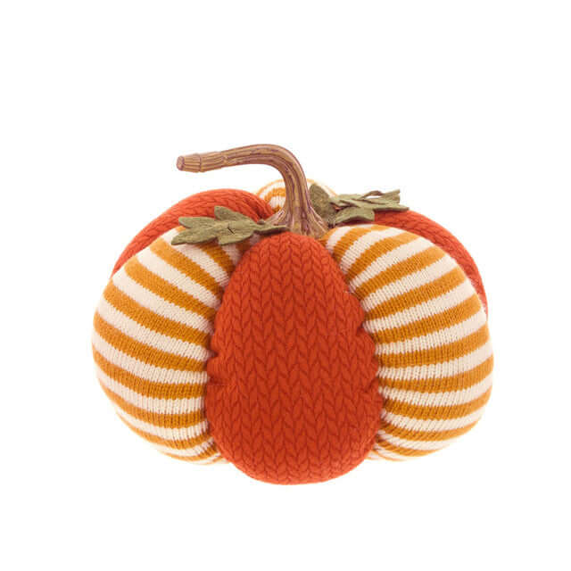 Knitted pumpkin with striped pattern on a white background