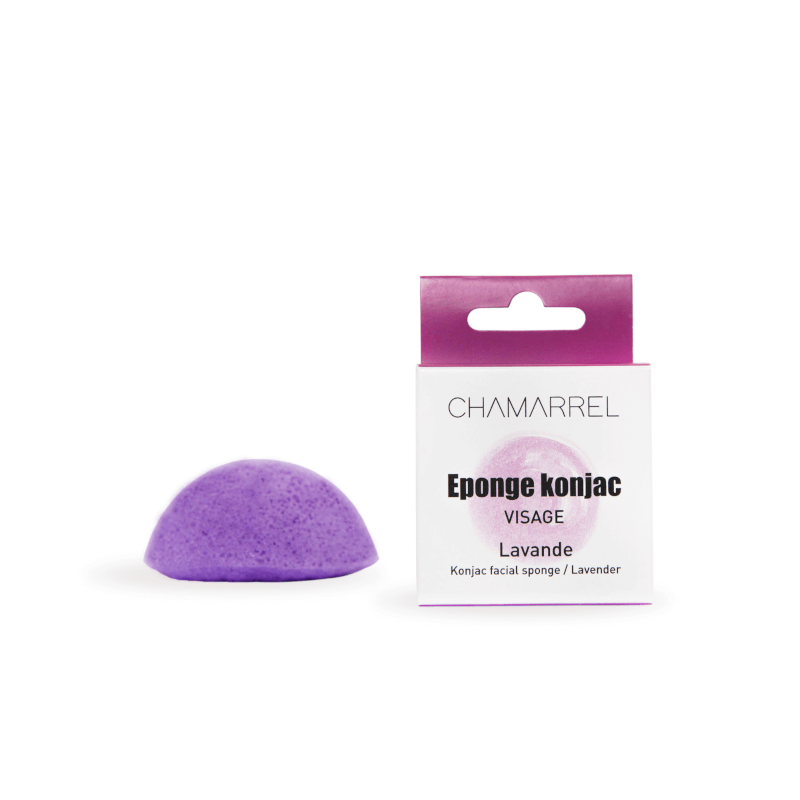 A purple Konjac face sponge next to its packaging, labeled as 'Eponge konjac Visage' with 'Lavender'.