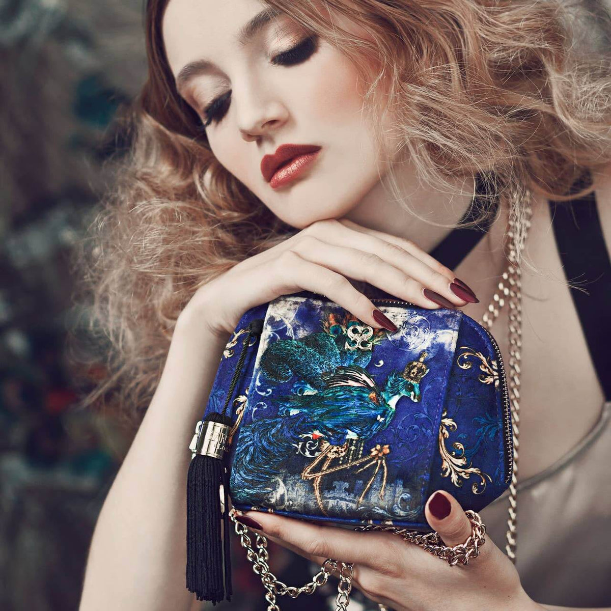 Lady holding a  Velvet Cross Body Bag - Paradisaea