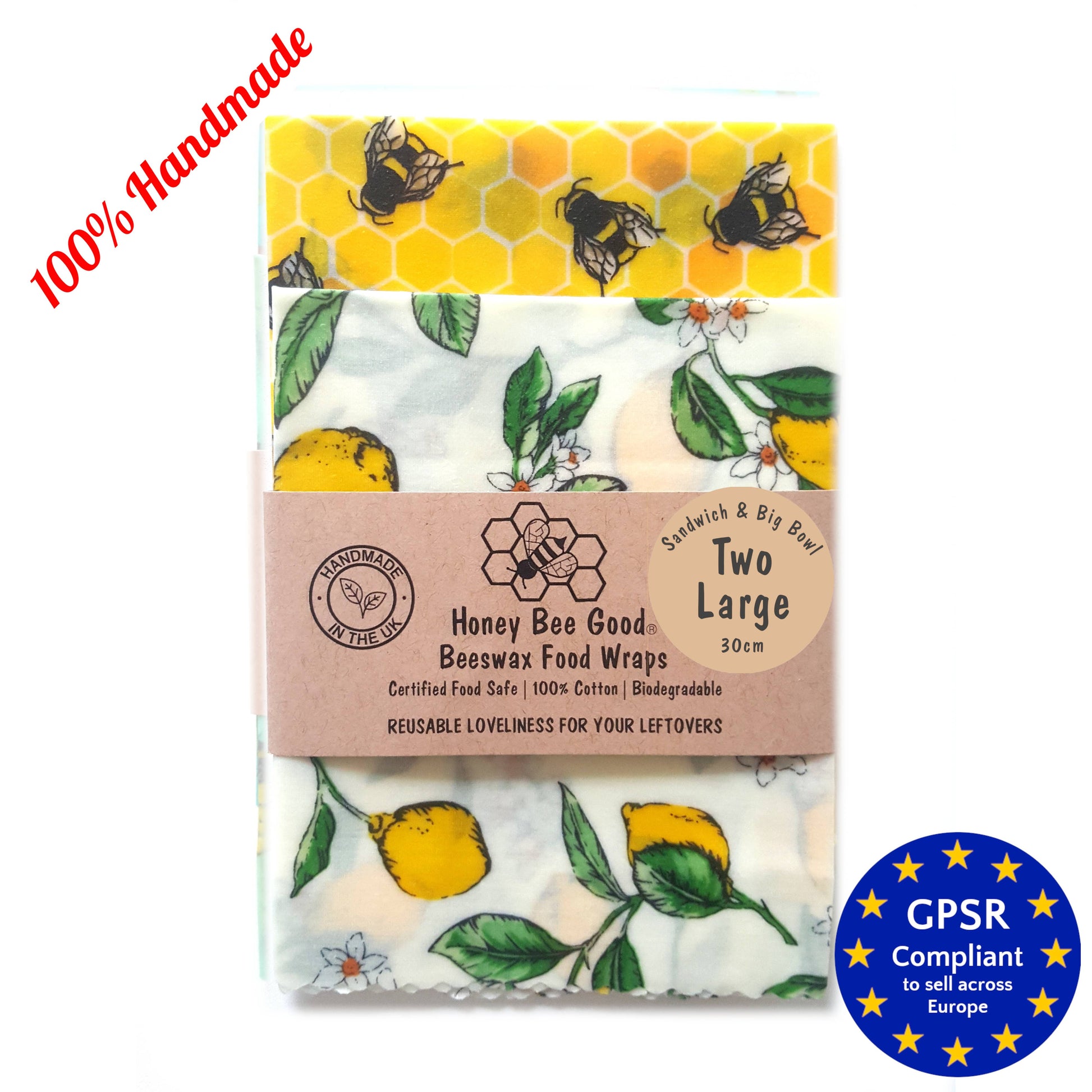 Two large  beeswax food wraps with a lemon and bees pattern, labeled as 100% handmade and certified food safe.
