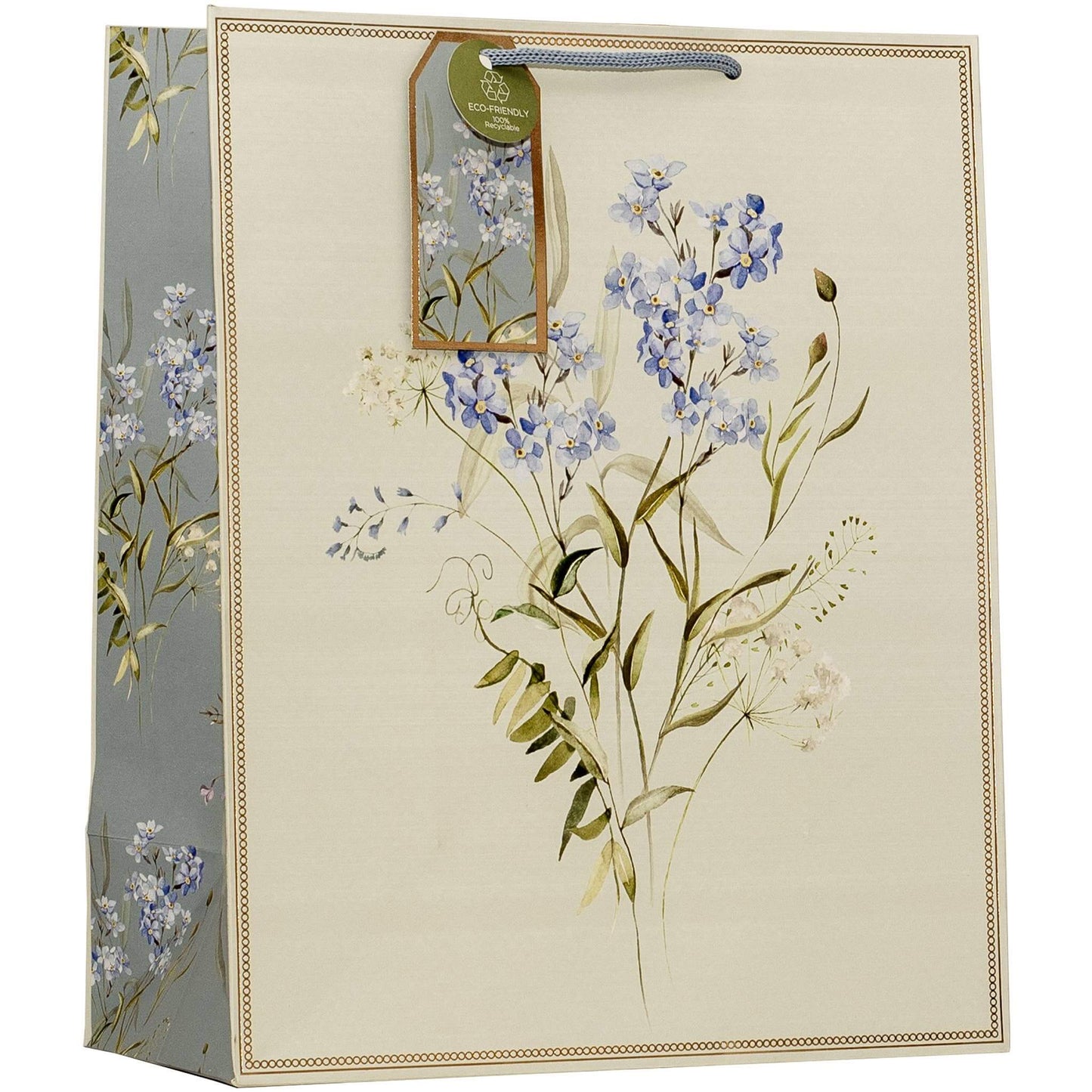 A decorative gift bag with a cream-colored front panel featuring a watercolor-style floral print of blue flowers and green leaves, with a gray patterned side panel and a hanging paper tag.
