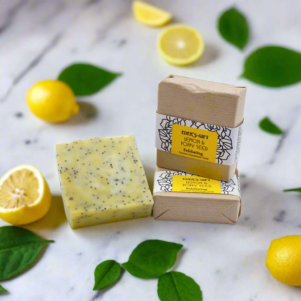 A packaged bar of Lemon and Poppy Seed handmade soap with a label showing the product name and exfoliating description.