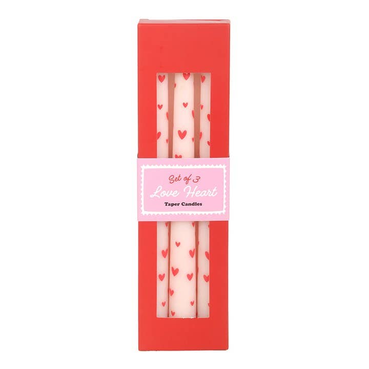 Set of 3 love heart taper candles in a red box with pink label