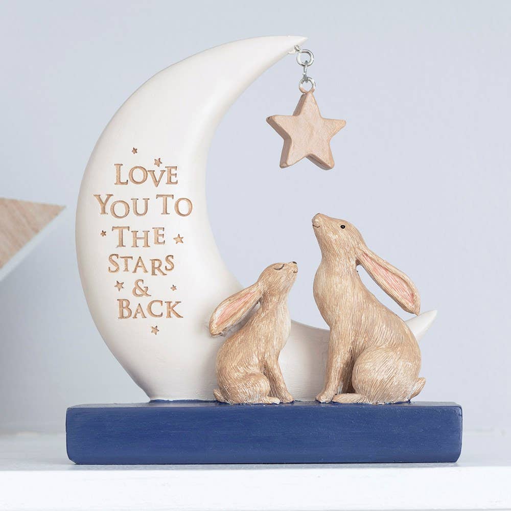 Decorative moon with rabbits and 'Love You to the Stars & Back' text on a white background