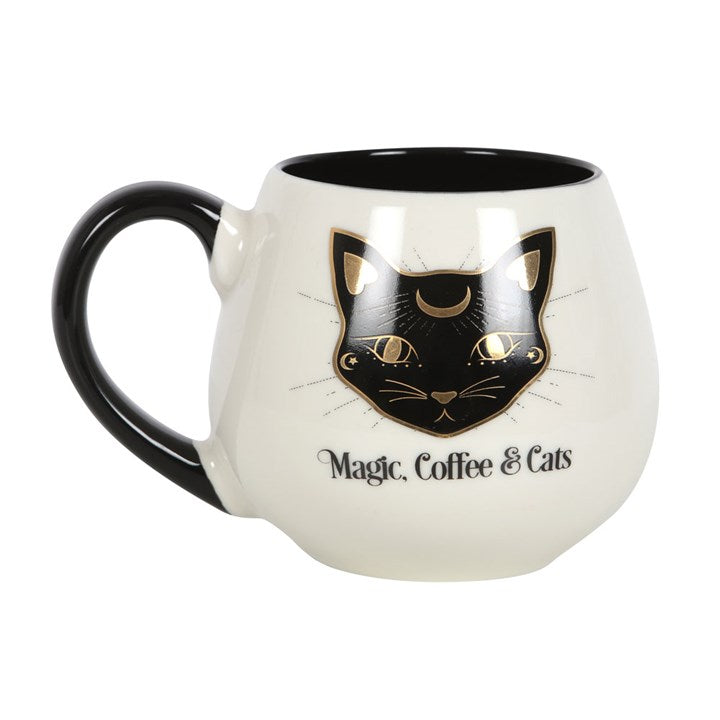 Cat-shaped mug with a black cat design and 'Magic, Coffee & Cats' text on a white background