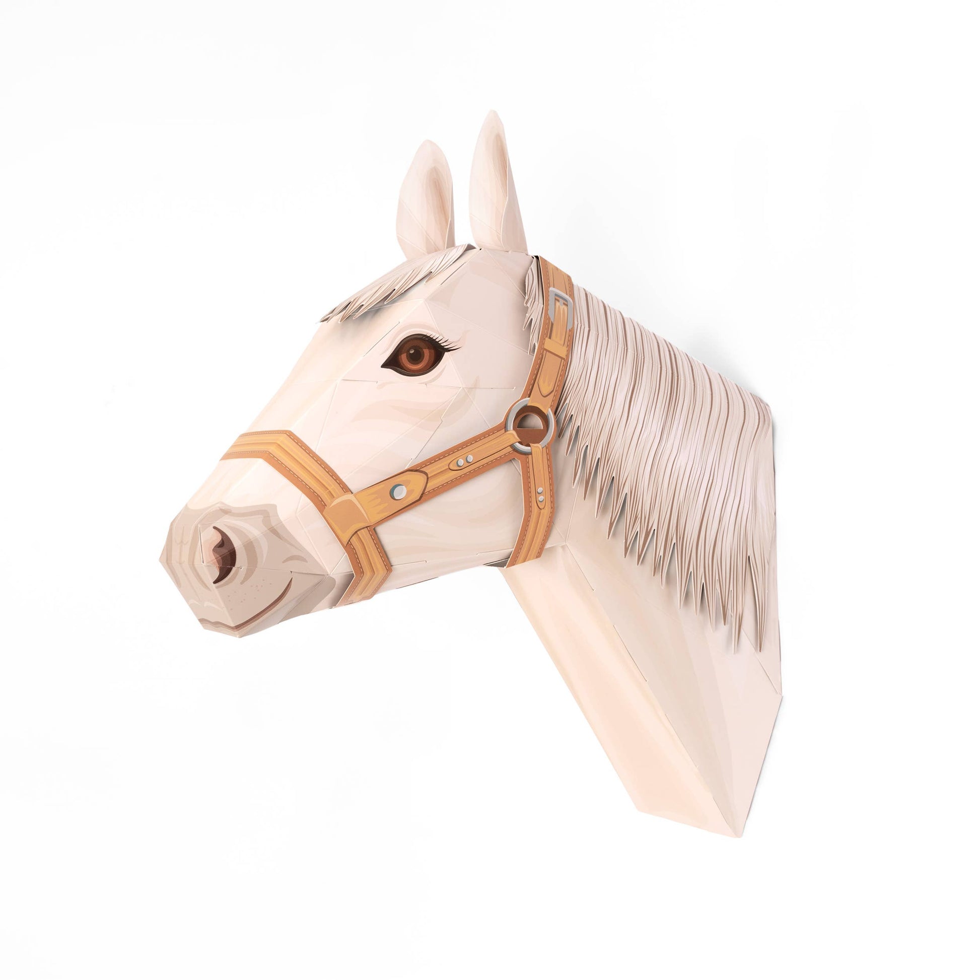 Horse head paper sculpture with a bridle on a white background