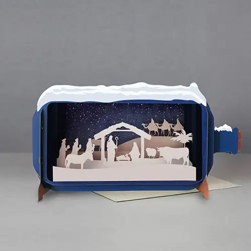 3D nativity scene pop-up card on a gray background