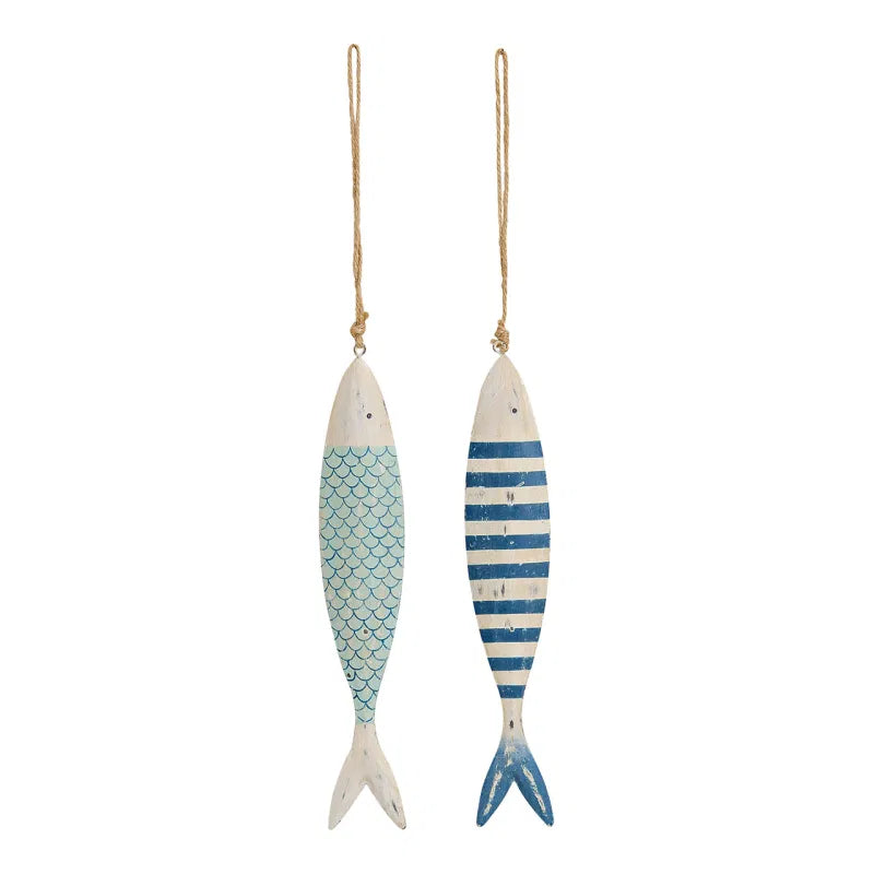Two decorative fish ornaments with mermaid scale and striped patterns on a white background.