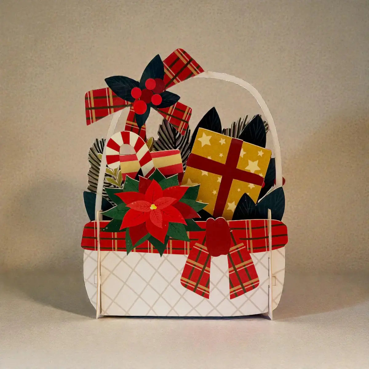 Decorative Christmas gift basket with red bows and presents on a beige background
